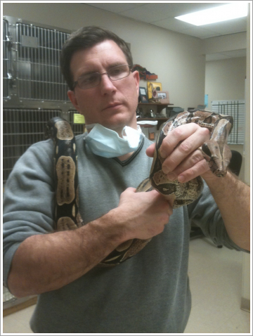 Dr. Huth holding the snake||||