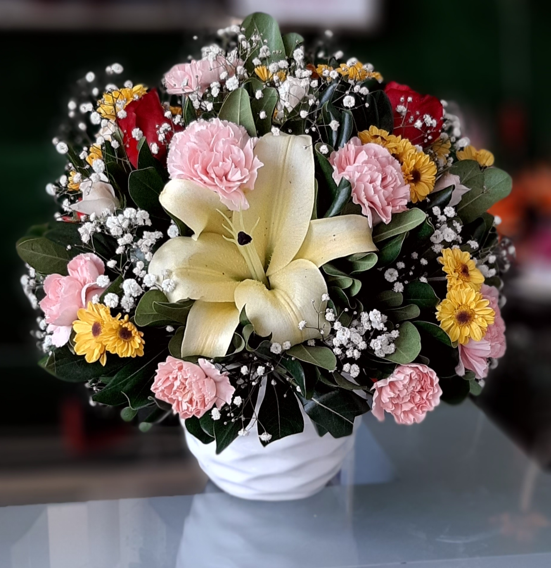 Arreglo primaveral en base de cerámica $ 1000