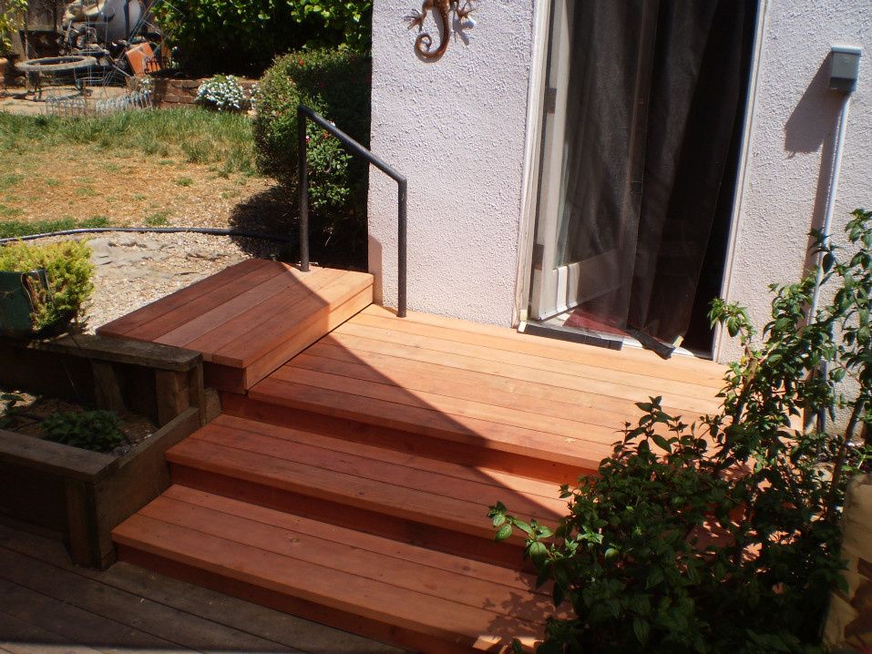New decking over uneven brick and concrete