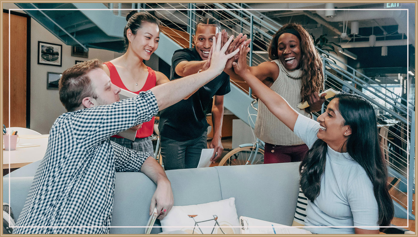 Group of young people celebrating.