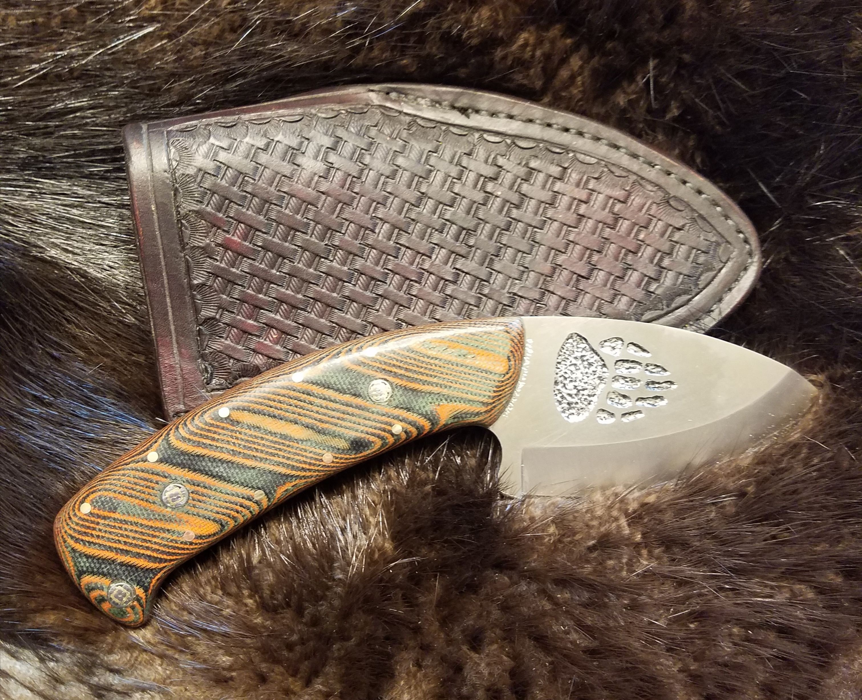 Grizzly Paw Engraved Skinner With Orange Dewcarta Handle, Hand Tooled, Hand Stitched Leather Sheath,   $180.00