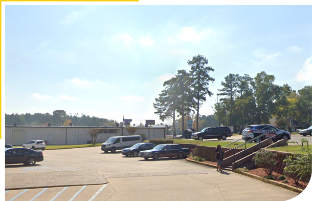 A photo of outside in a parking lot