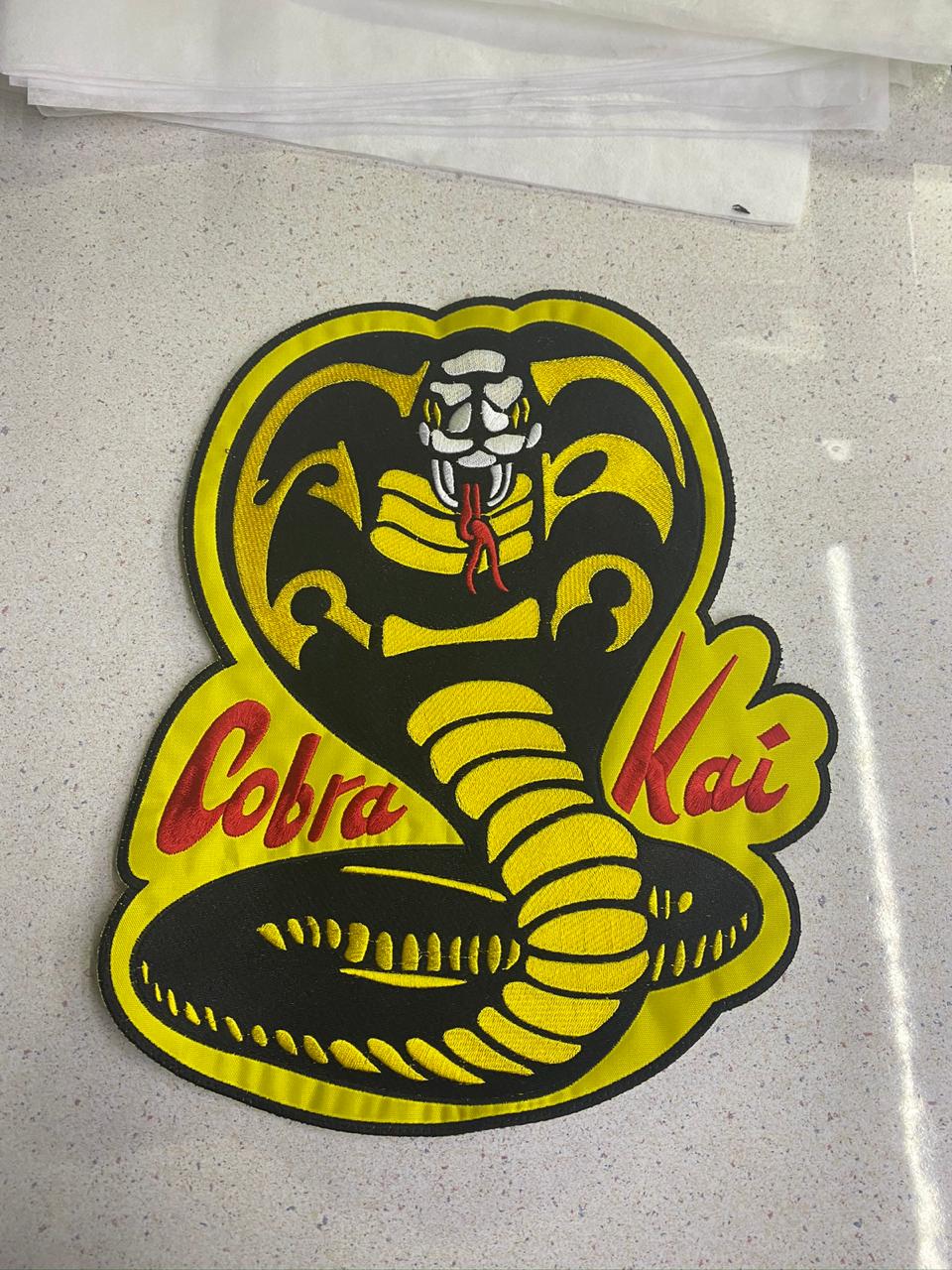 https://0201.nccdn.net/1_2/000/000/08b/c9e/cobra-kai.jpeg