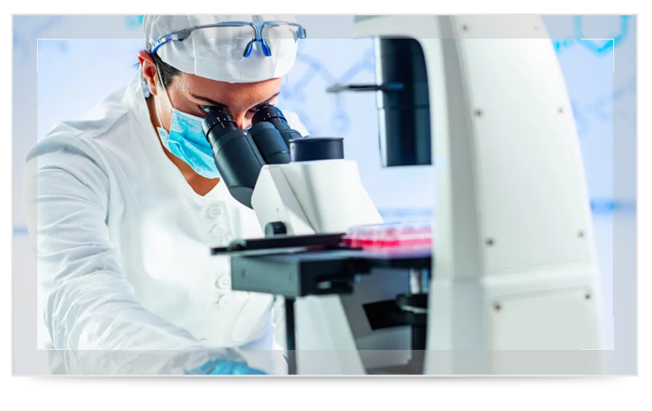 A scientist looking into a telescope A scientist looking into a telescope