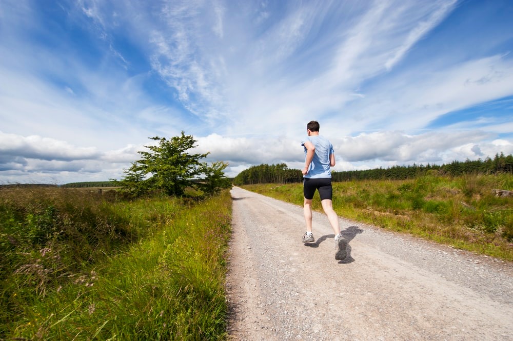 A Man on a Jogging Trail