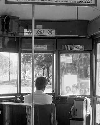 Photo of a bus driver’s back