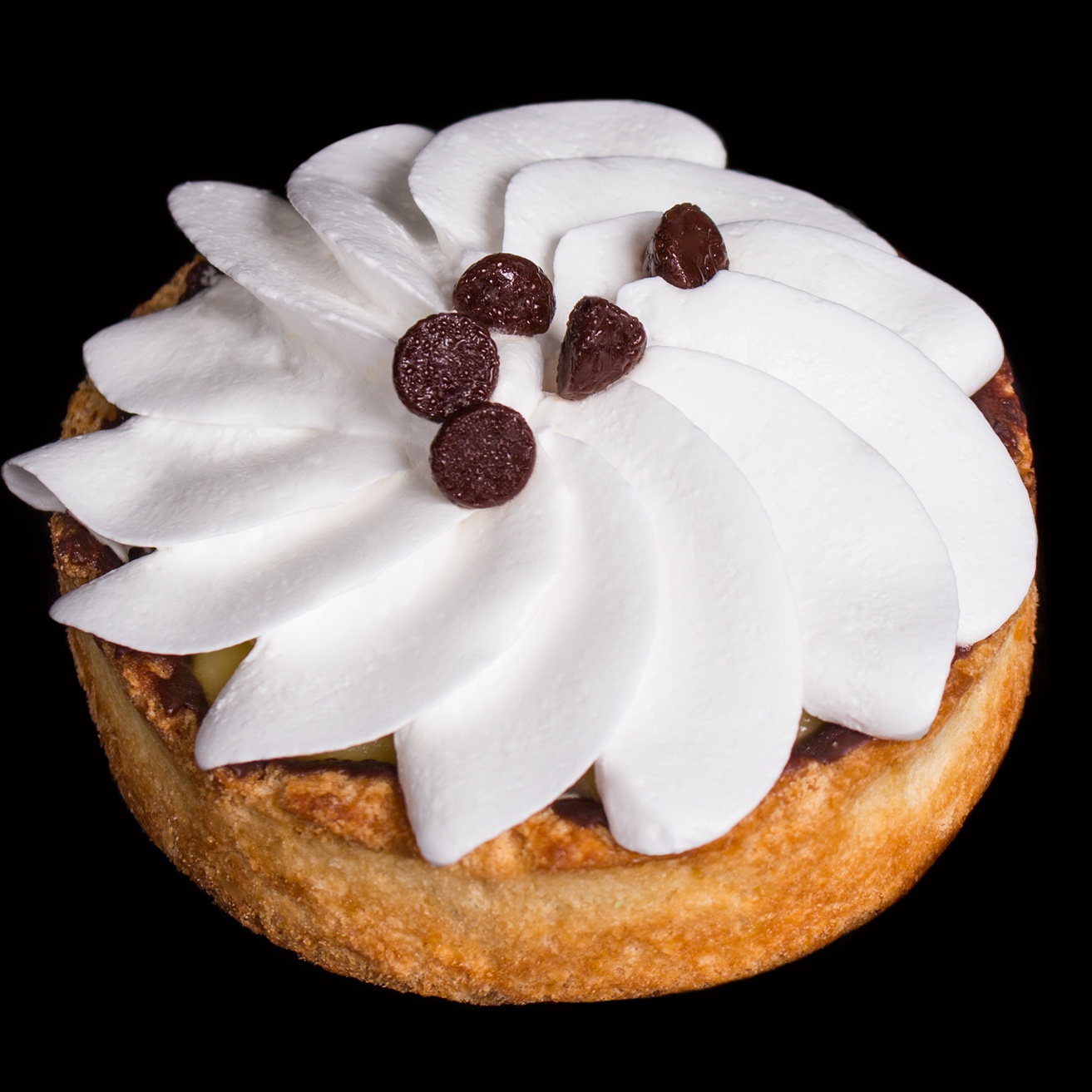 Tartaleta cítrica
Crema de kalamansi y limón, con galleta de limón cubierta de chocolate