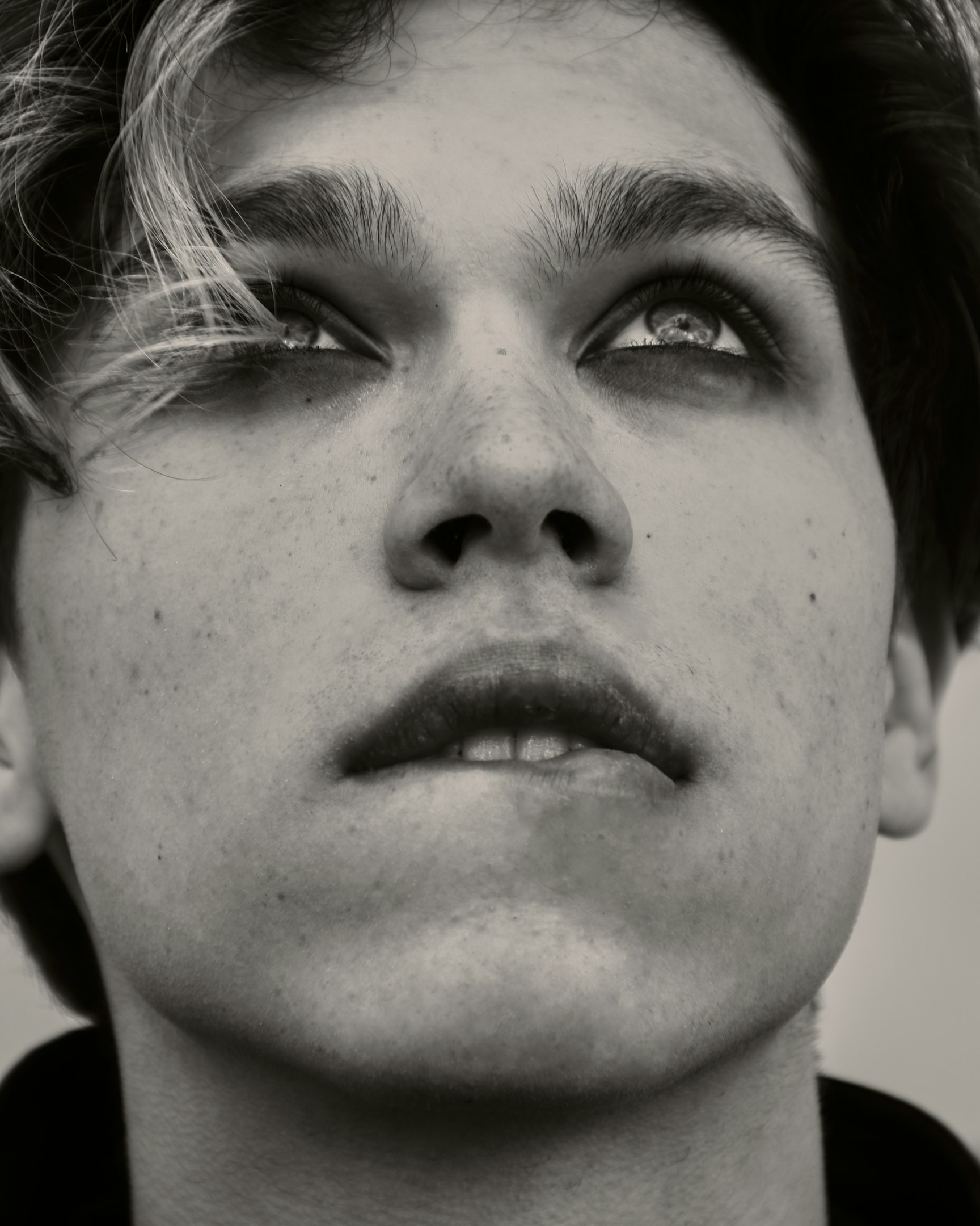 mans face in grayscale