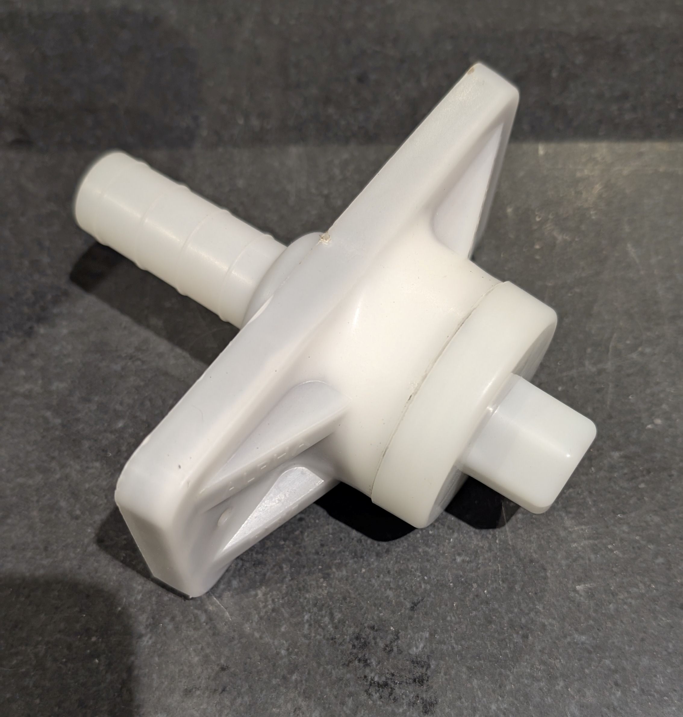 Over molded part for concrete tensioner 