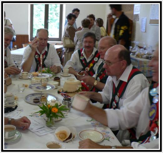 The Merrydowners taking time out to sample the tea and cakes 