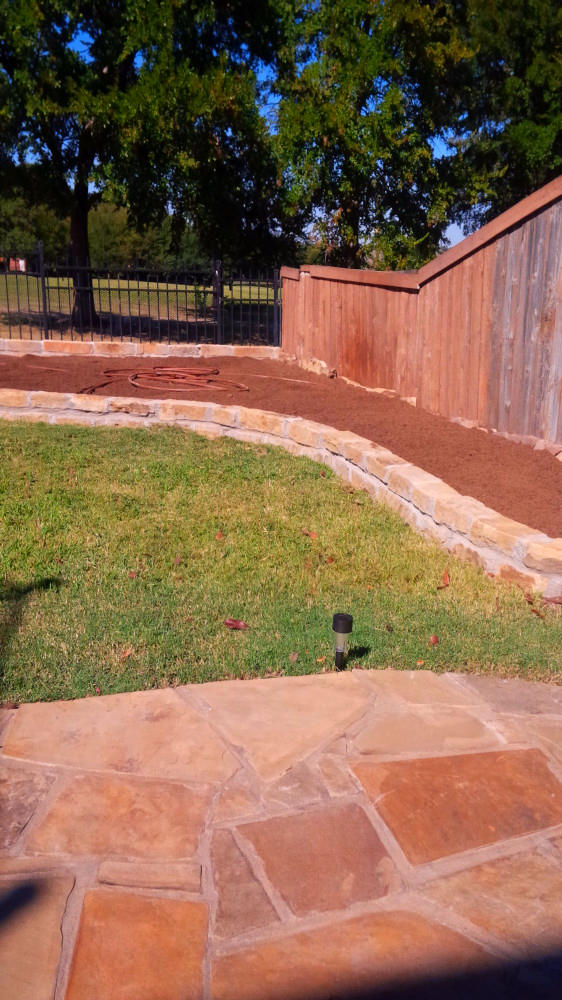 Flagstone patio and oklahoma stone borders