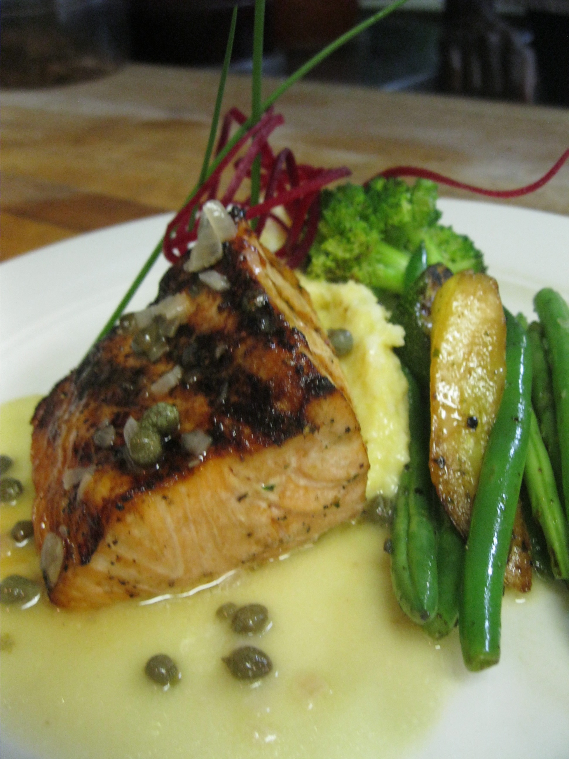 Grilled Wester Ross salmon with a lemon caper burro bianco