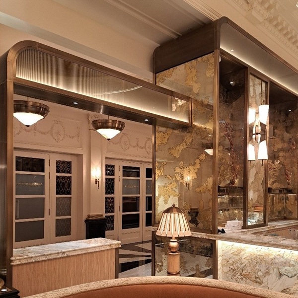 Patinated brass metalwork at The Savoy 'Gallery' The Strand