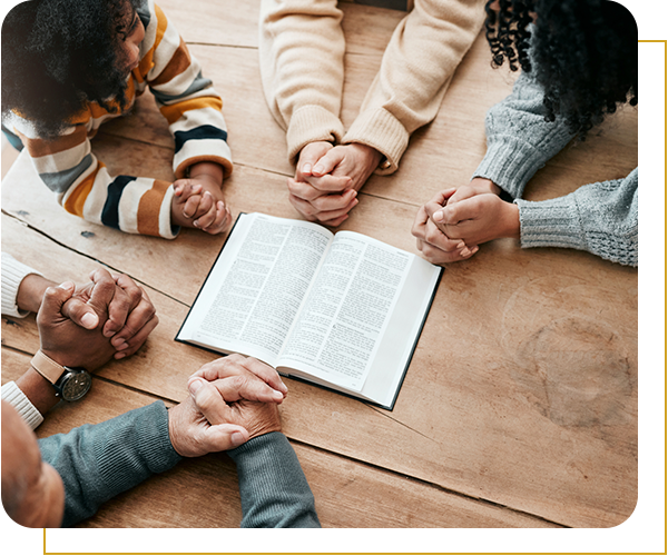 Family studying bible