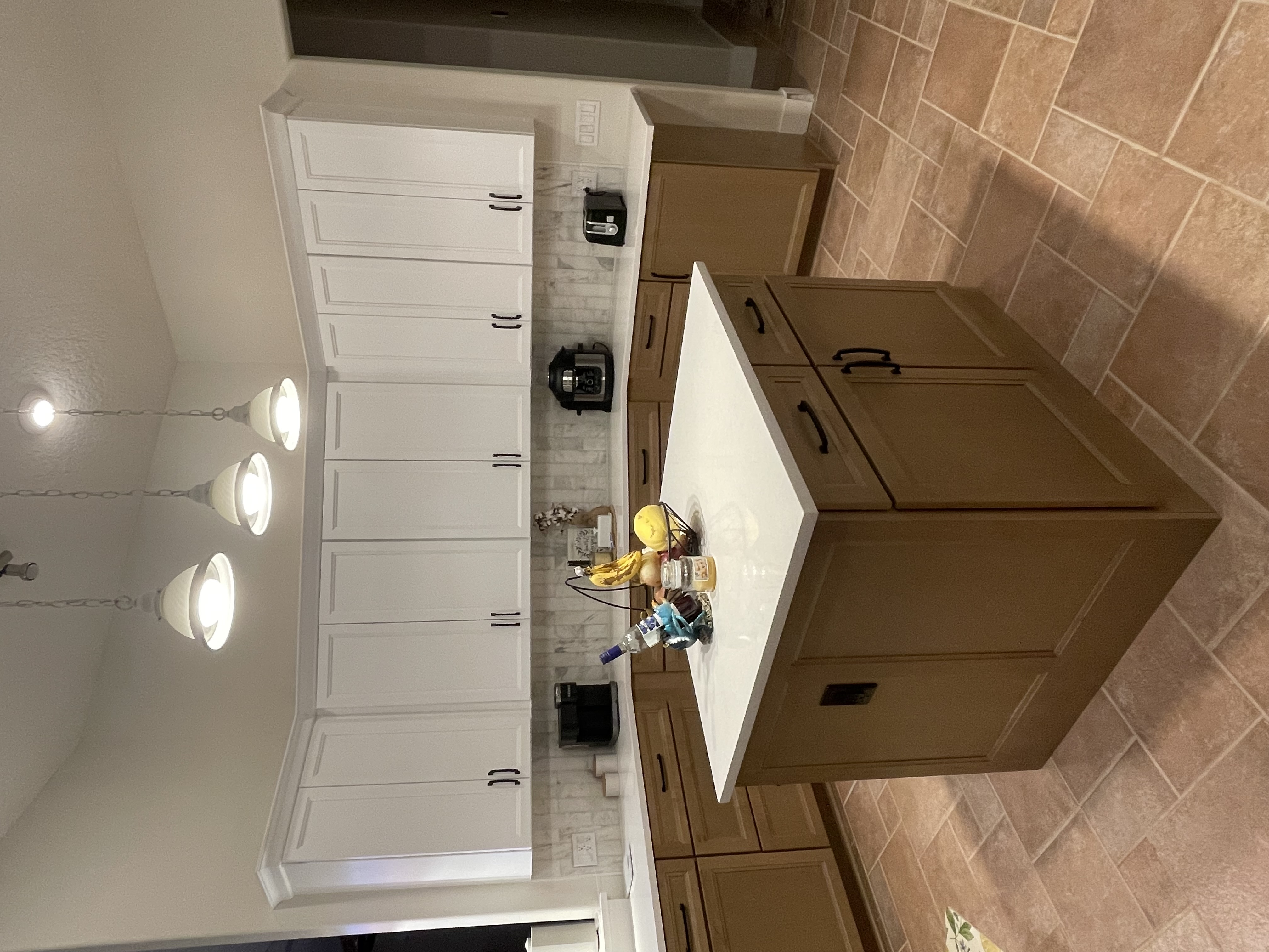 The center island is a convenient and functional space to prep meals and gather around.