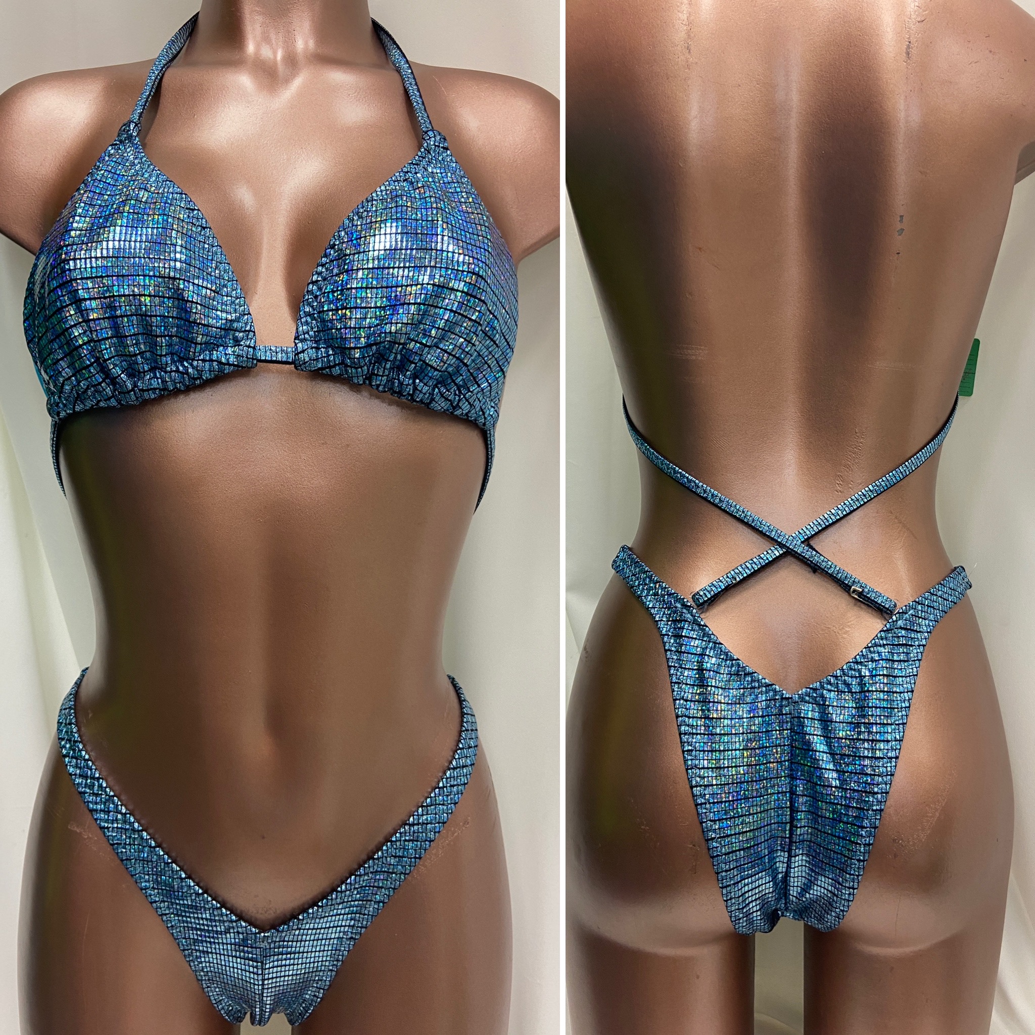 P7011
$85 
C sliding top
small front +1" each hip
xsmall back
light blue abstract hologram 