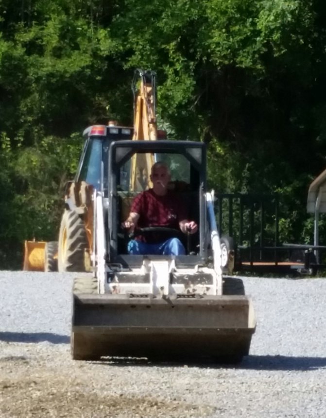 Chuck Kimmen on our Bobcat