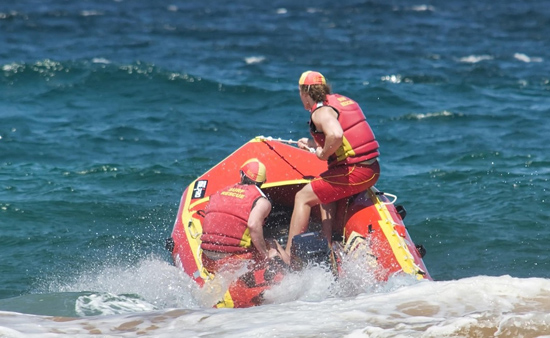 Two people wearing life jackets