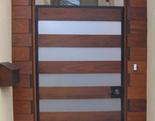 Entranceway door is custom ipe, steel and Perspex&#xAE;&#x2014;all fabricated onsite.