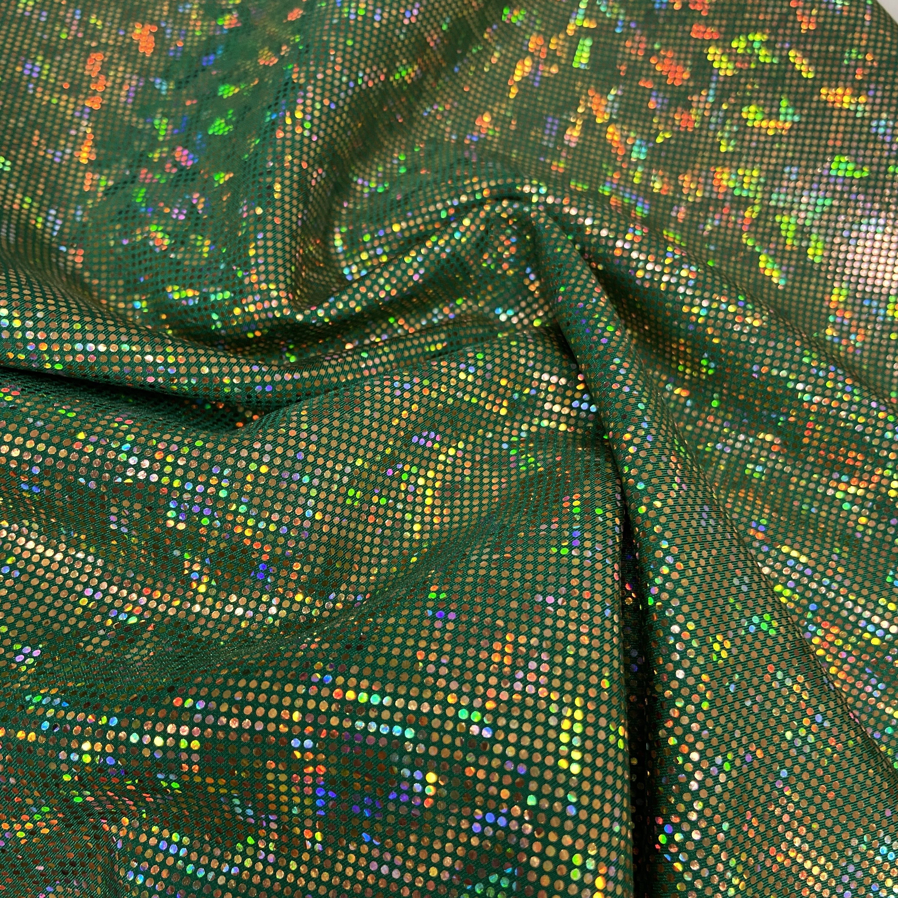 Gold shattered hologram on green 