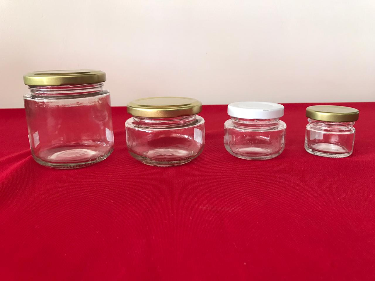 BOTELLA DE VIDRIO REDONDA 32 ML.