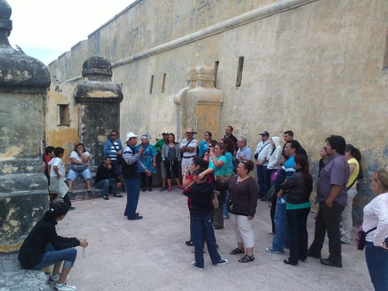 Person doing yoga on a mountain hill