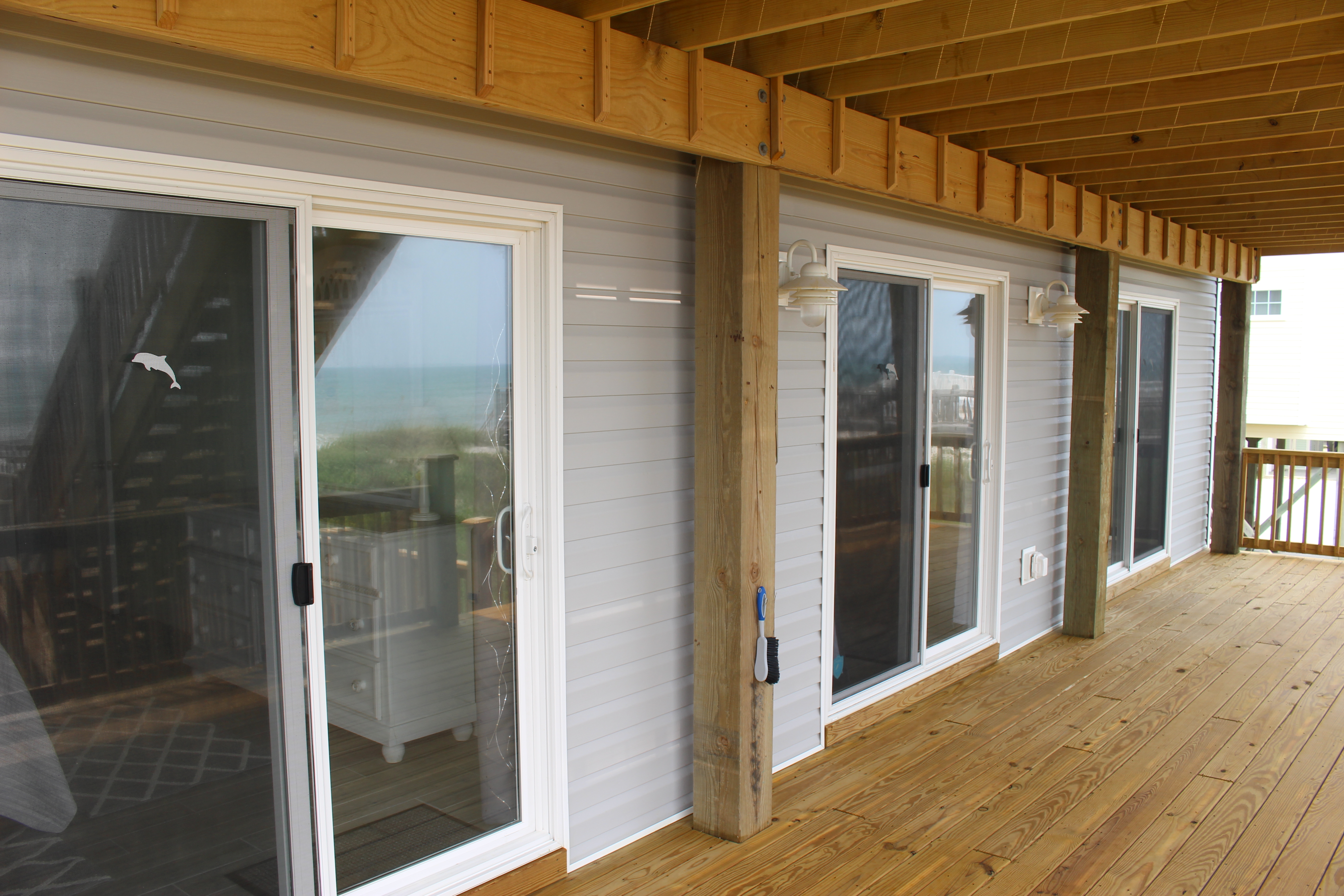 Northerly view of the three bedroom sliders facing the beach