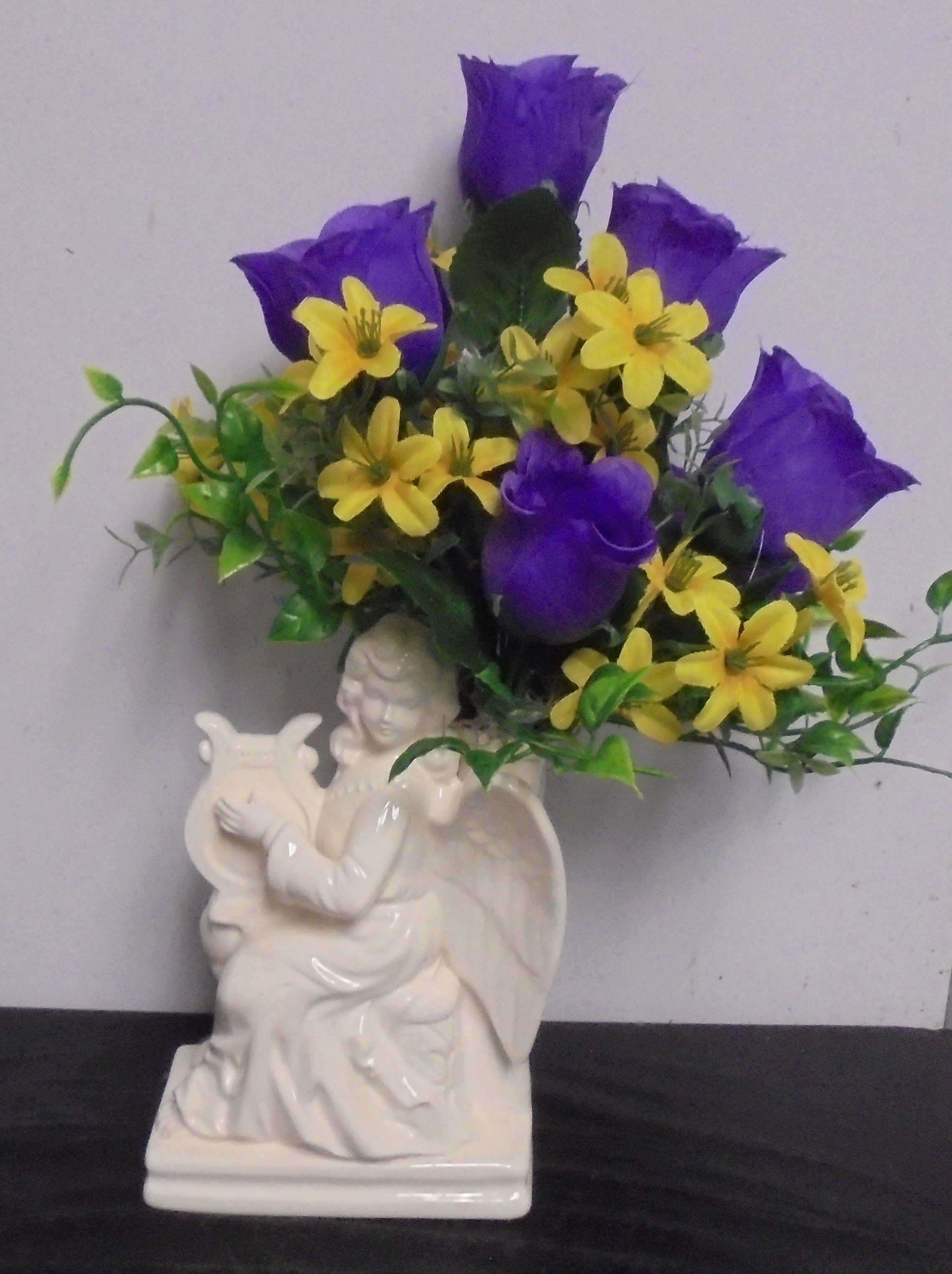 (1)  "Silk" Angel Arrangement
 (Purple & Yellow)
$25.00