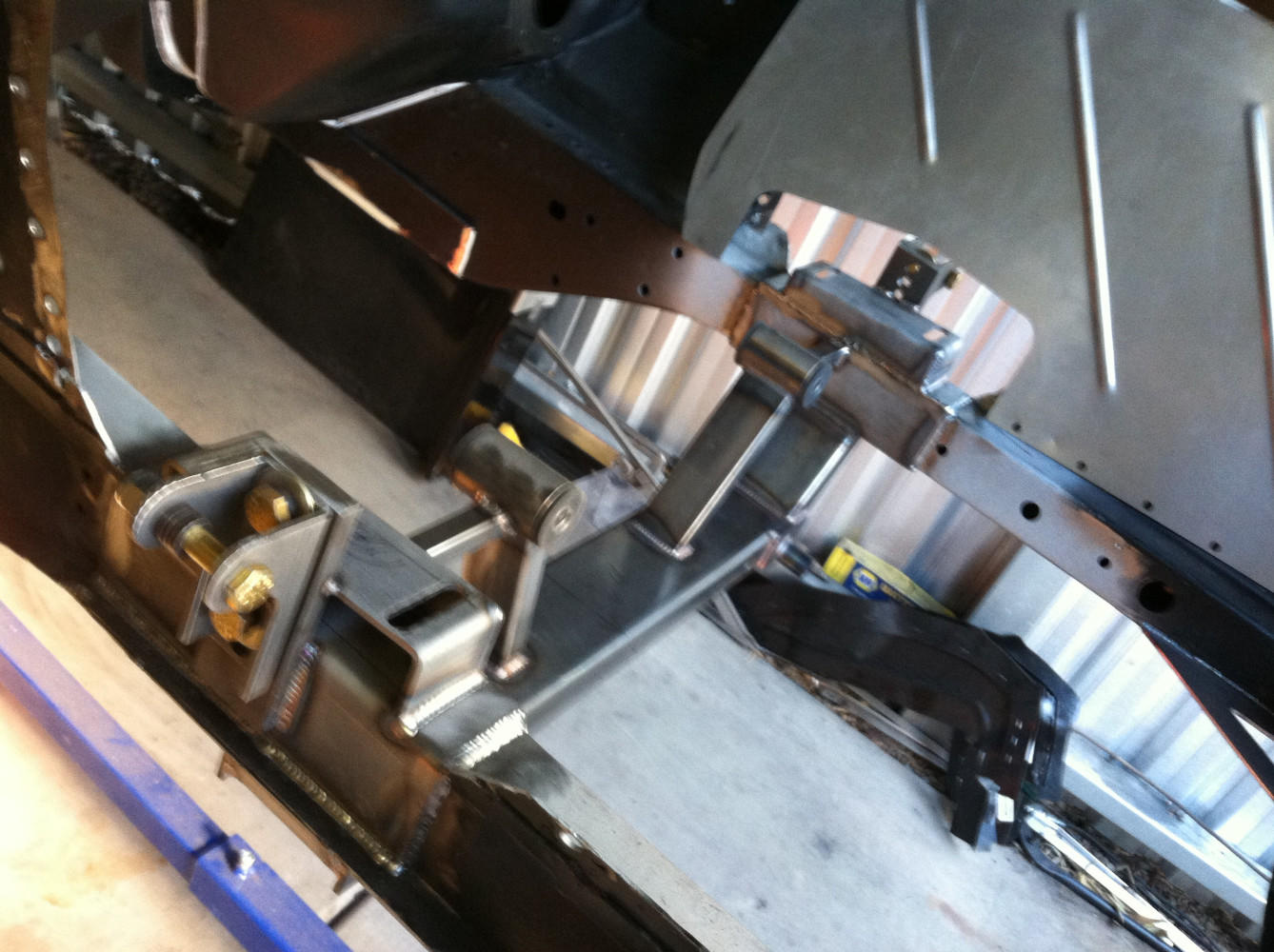 Remove shock towers and add new cross member