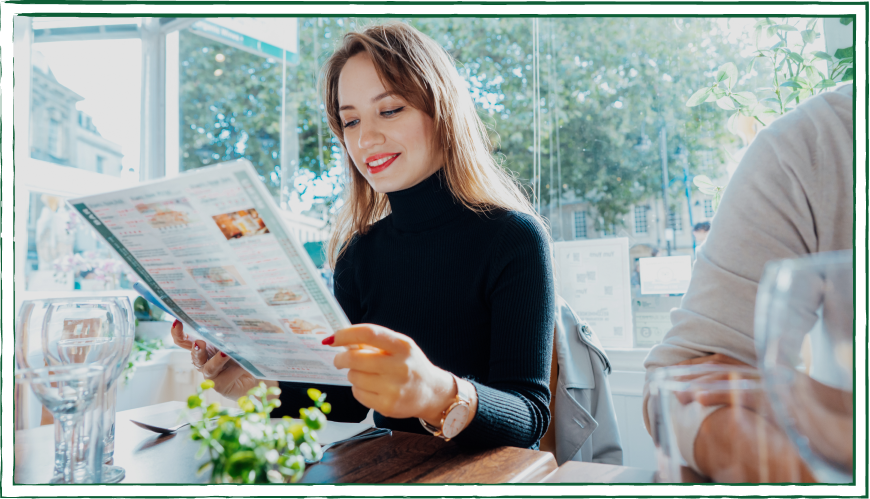 A woman reading a printed document A woman reading a printed document