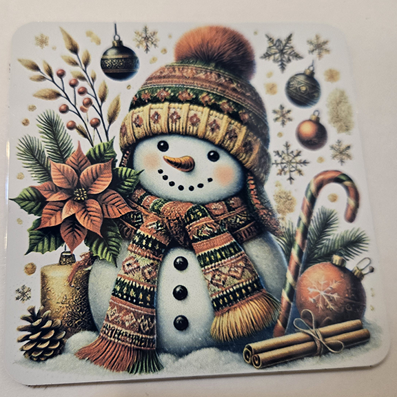 Square metal coaster with a snowman design