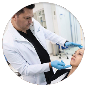 A doctor tilting a patients head back