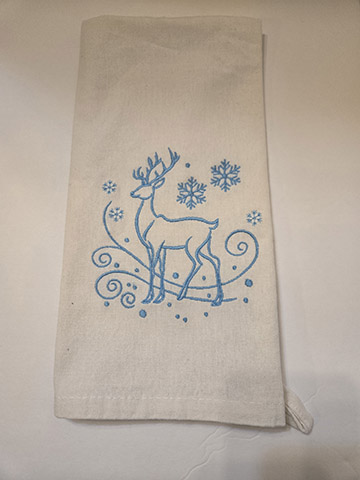 Flower sack towel featuring a blue deer design