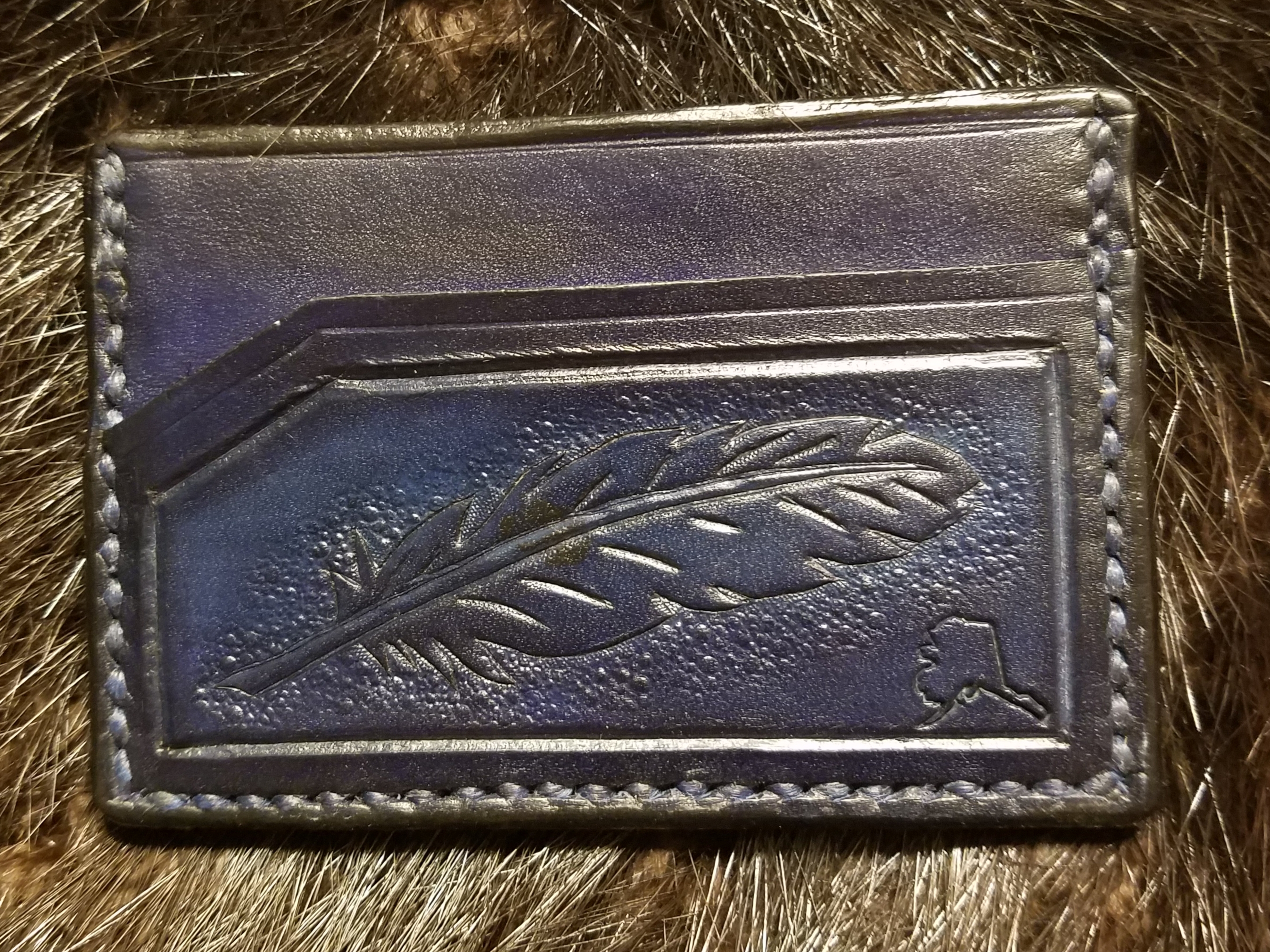 Feather, 3 pocket minimalist wallet, hand tooled and stitched,   $65.00