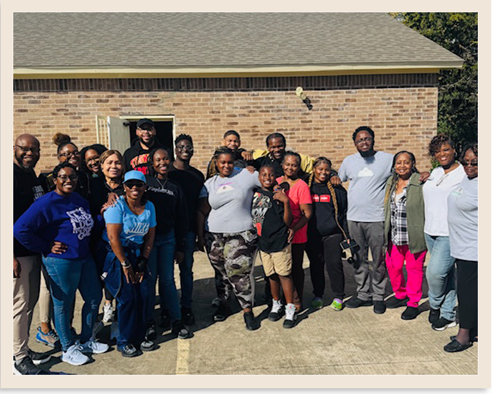 A photo of several volunteers posing together