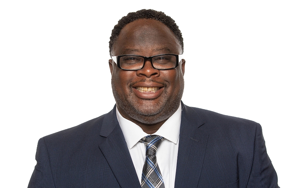 A photo of Dr, Harris smiling