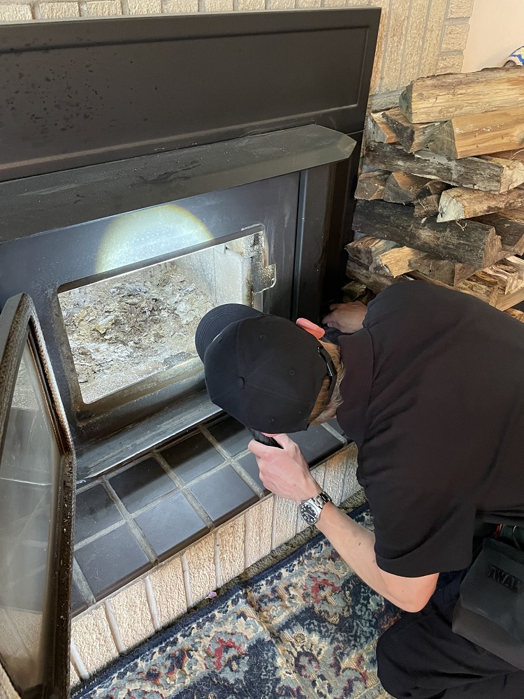 https://0201.nccdn.net/1_2/000/000/0a9/3f0/inspecting-fireplace.jpeg