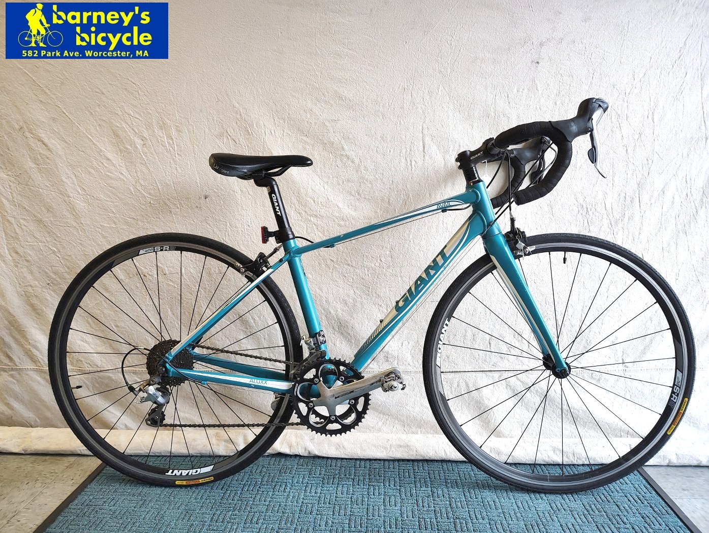 Women's Giant Liv Avail 2
Frame:  XS, Aluminum/ Carbon Fork
Rider Height: (5'1-5'4)
Drivetrain:  Shimano 105 2x10 
Price: $689.00 (Professionally Tuned)
