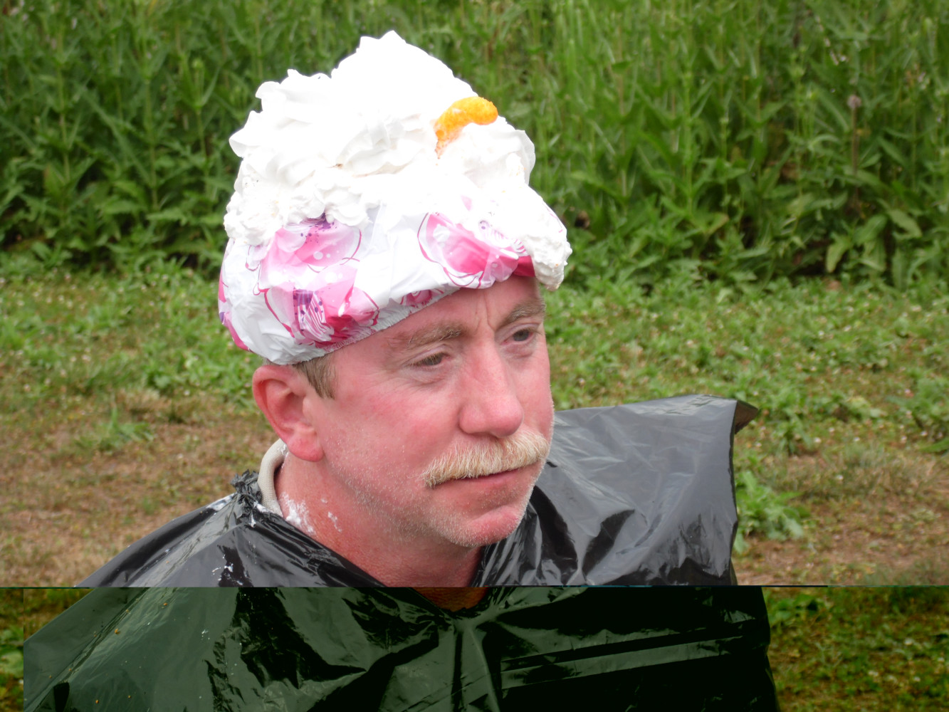 Bobby Salter volunteers to have Cheetos thrown at his whipped cream covered head.   