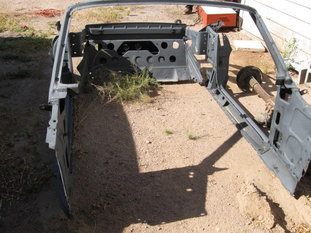 No floors, quarters, no nothing! But its got the rockers and windshield frame. 