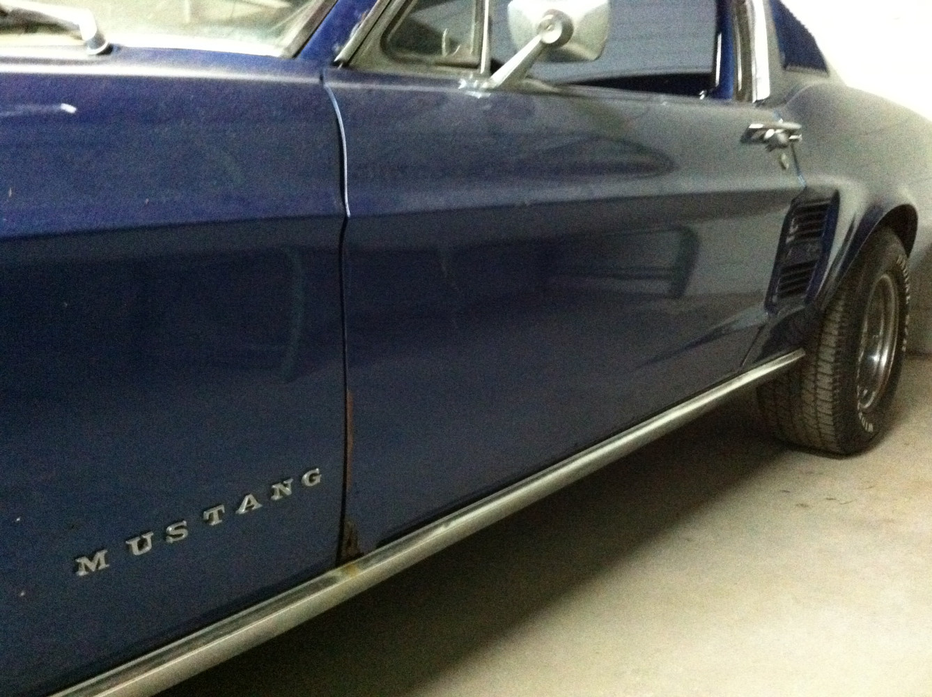 Rust at the bottom of the door and fender