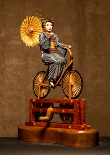 https://0201.nccdn.net/1_2/000/000/0ad/e67/Geisha-en-bicicleta-222x314.jpg