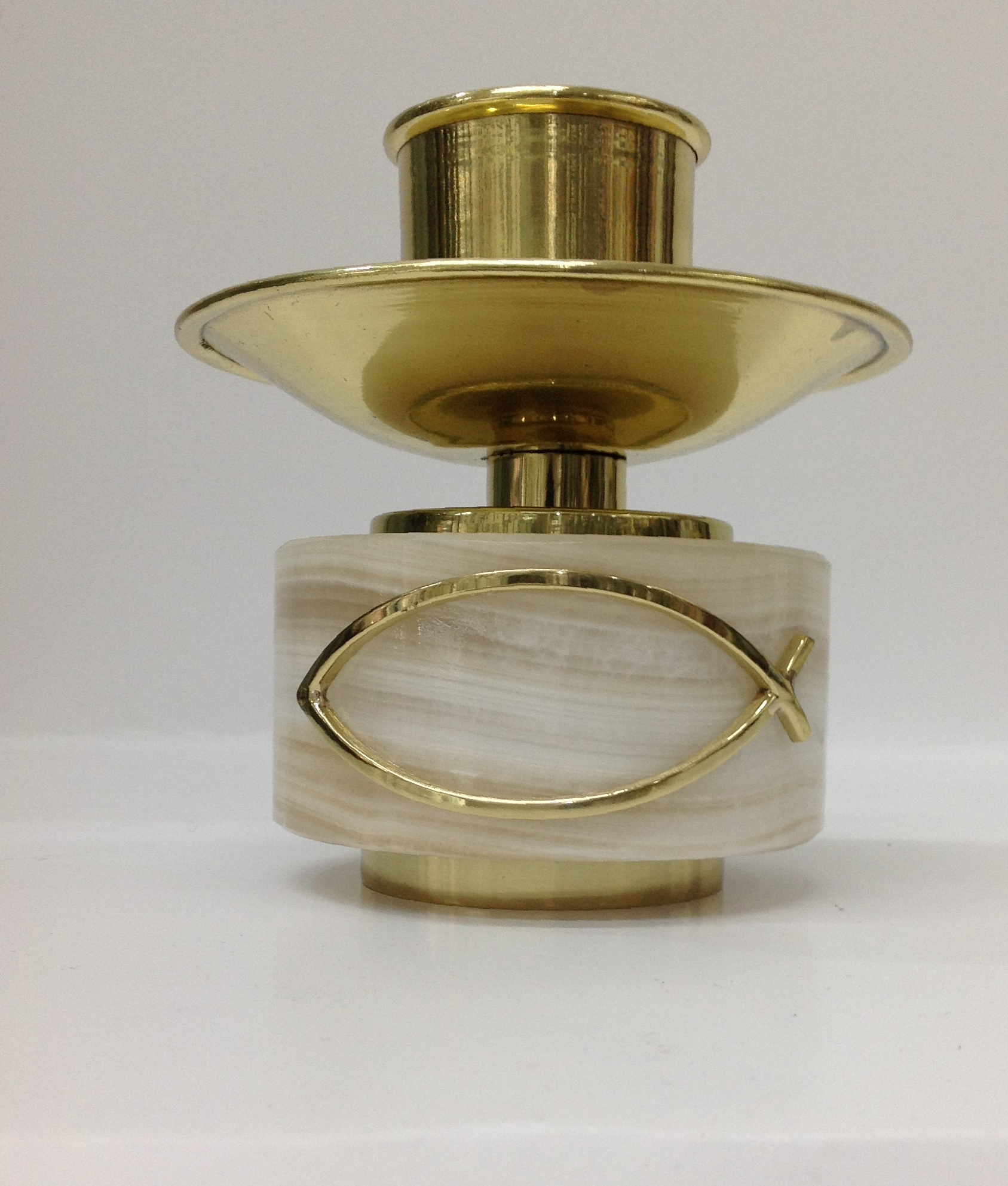 CANDELERO DE BASE DE ONIX Y LATÓN DE 2" Y DE 1 1/2"

preguntar por existencias.