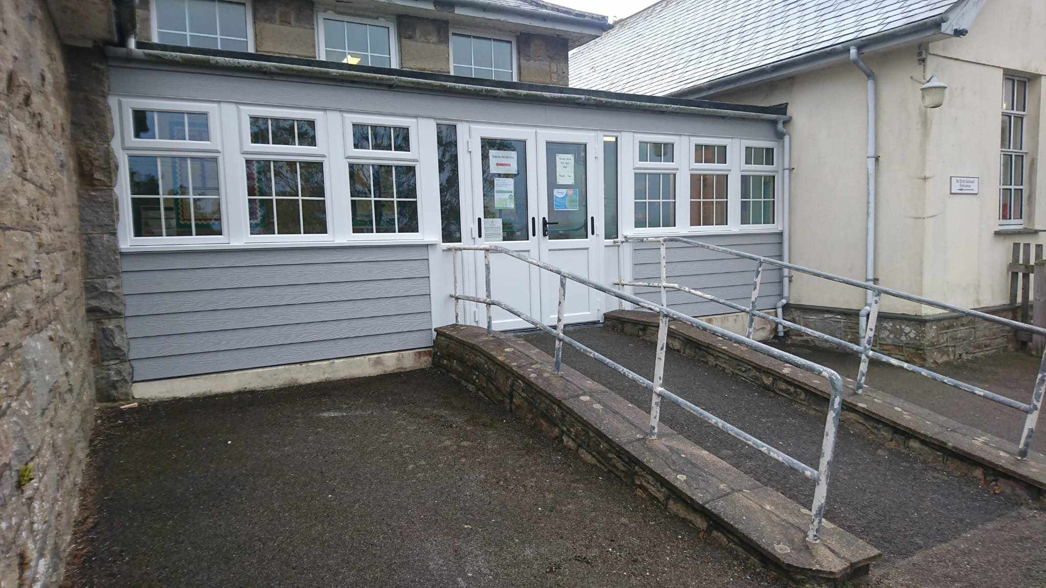Installation of new UPVC windows  and doors, with  fibre cement cladding.