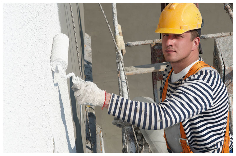 Man painting the wall||||