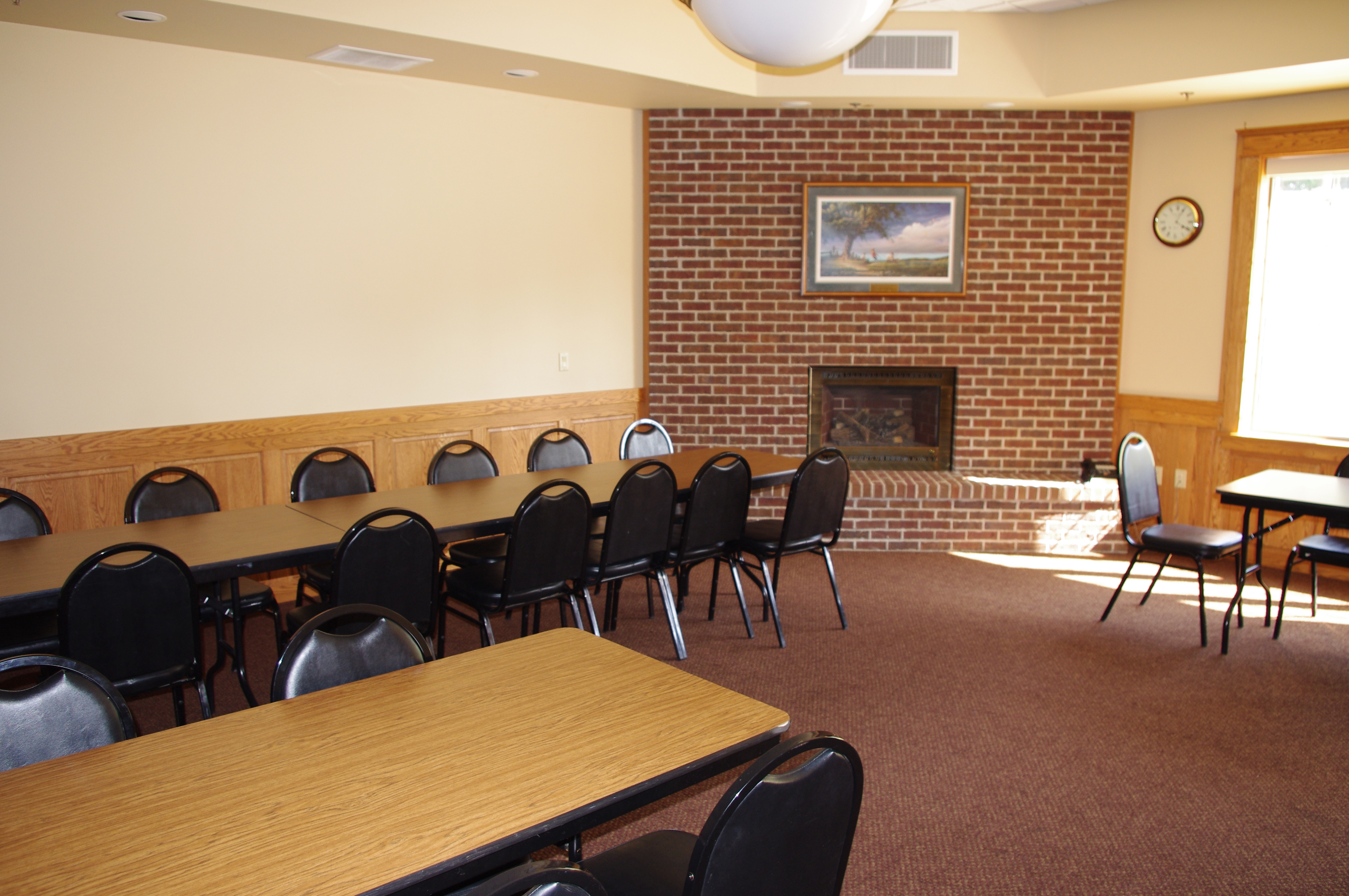 Sprague Room with table rows and presenter table