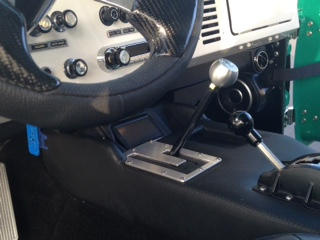 Custom made console with insert for the fast fuel panel.