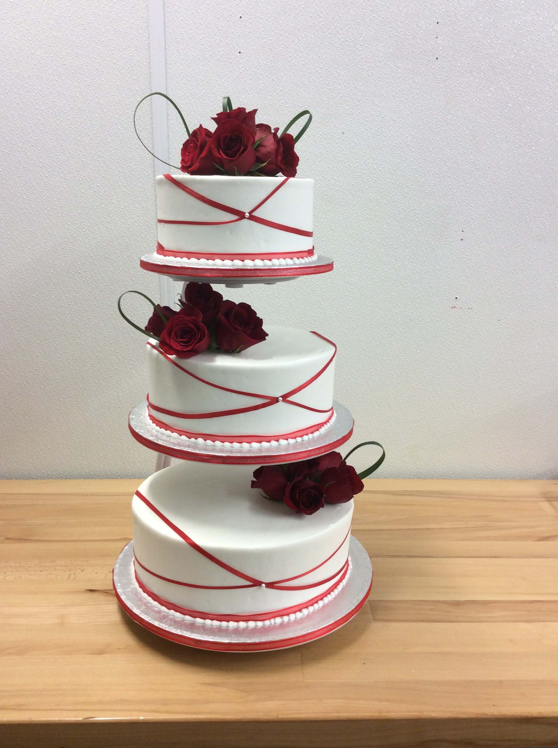 Three-Tier Cake With Red Roses
