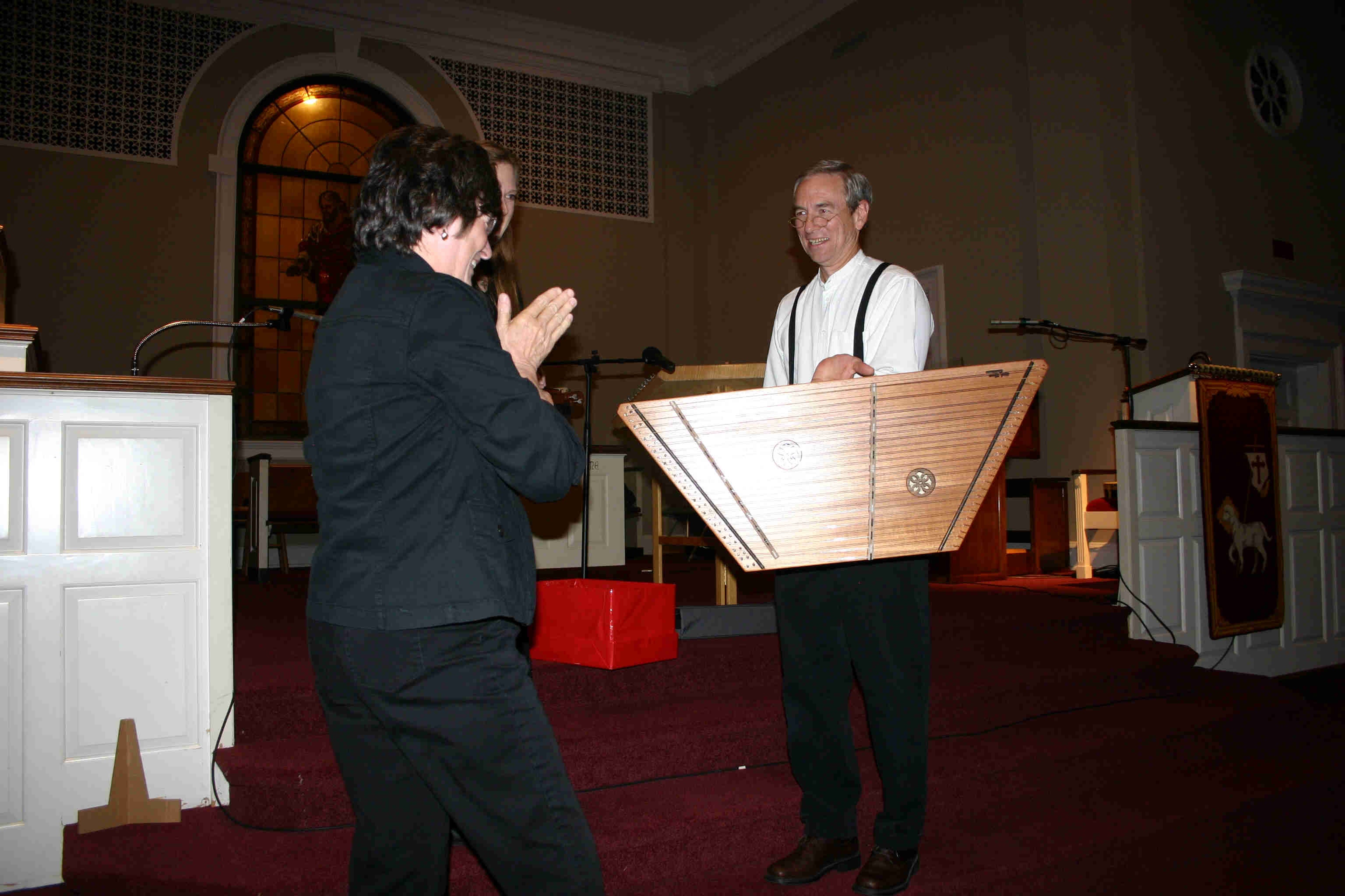 Sherril Blair winning hammered dulcimer 2007. Rick Thum presenting.