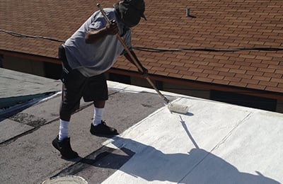 Man Repairing Roof